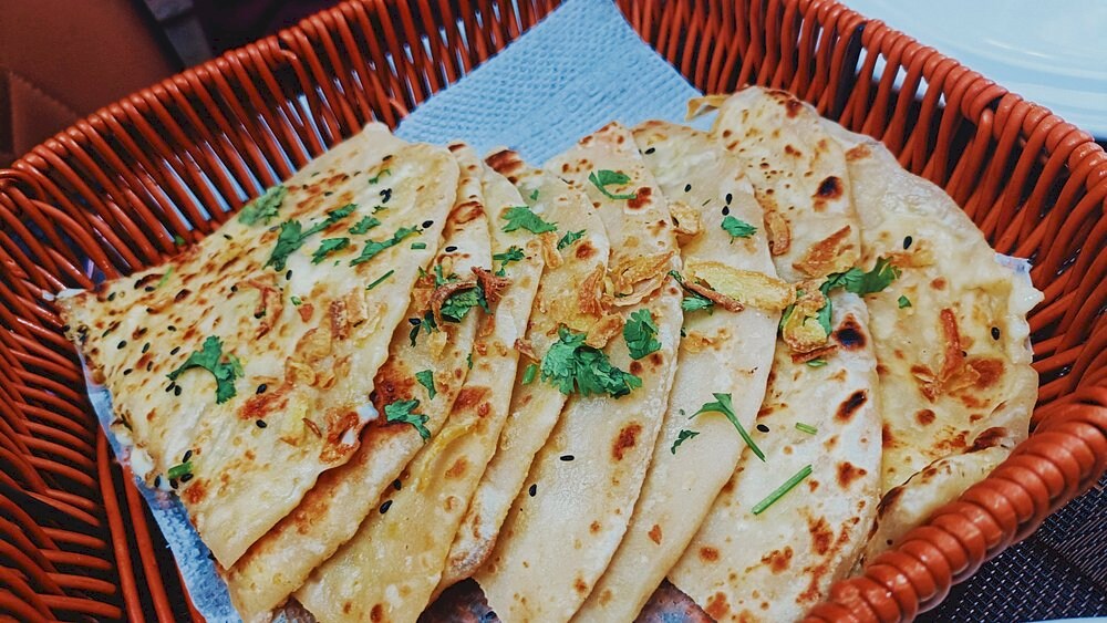 Freshly baked naan at Kachi Kitchen